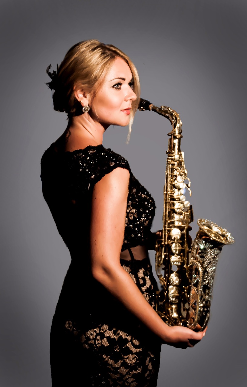 FEMALE SAXOPHONIST performance