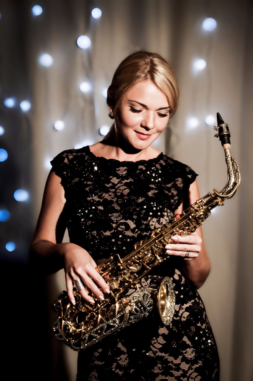 FEMALE SAXOPHONIST performance