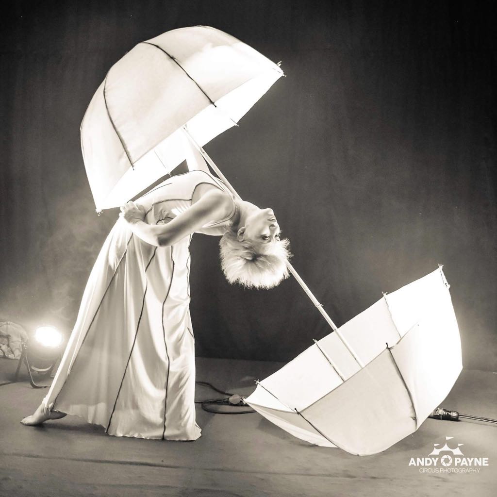 Umbrella Foot Juggler performance